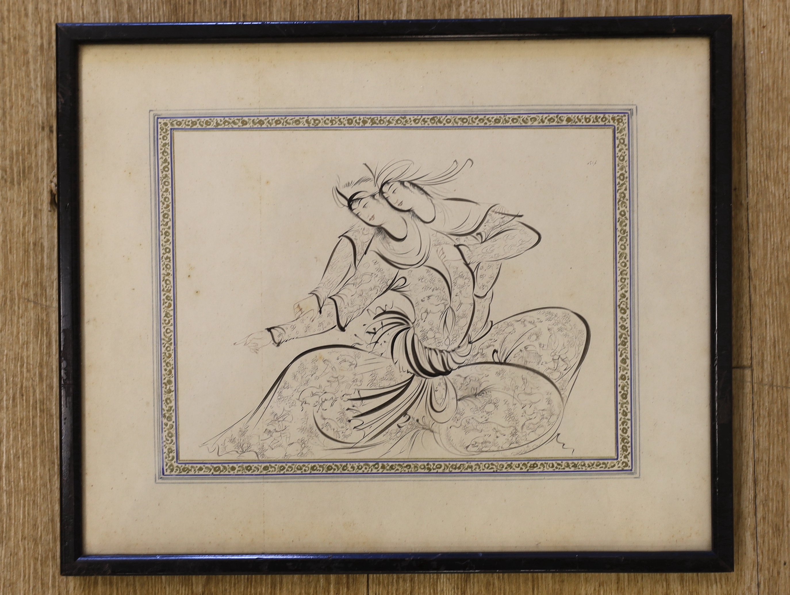 Late 19th / early 20th century Persian School, pen and ink, two figures dancing, label verso, 22 x 17cm